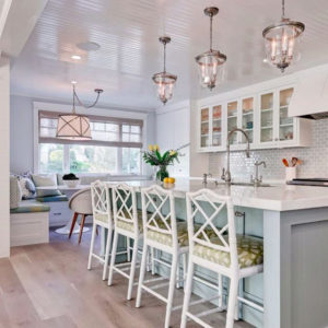 Kitchen with shaker style cabinets and a Waterstone faucet.